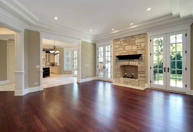 stunning acacia hardwood flooring in a luxurious master bedroom